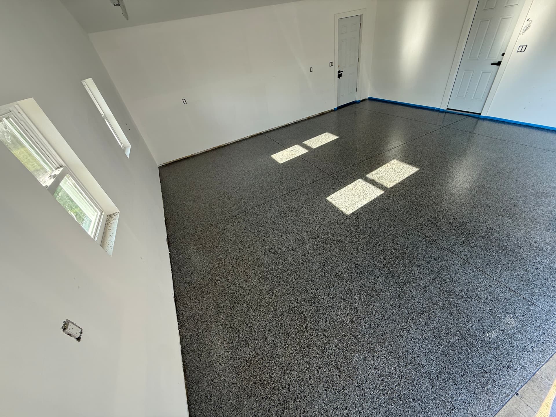 Showroom package flake epoxy garage floor with satin finish in Southwick, MA